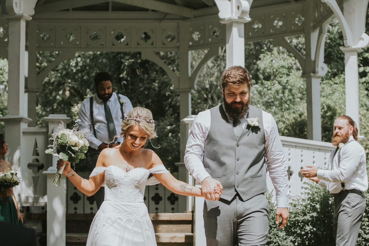 Couple leaving the gazebo after the ceremony